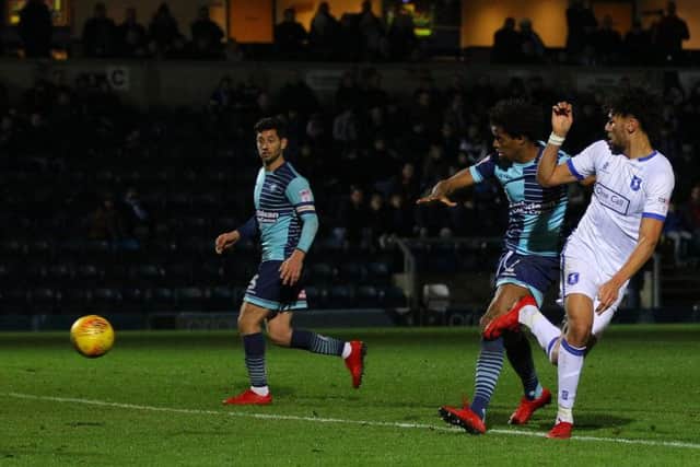 Lee Angol nets the winner at Wycombe. Photo by Howard Roe.