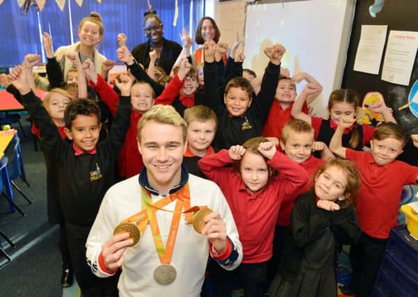 Paralympian gold medalist Ollie Hynd visits Bulwell St Marys primary school.