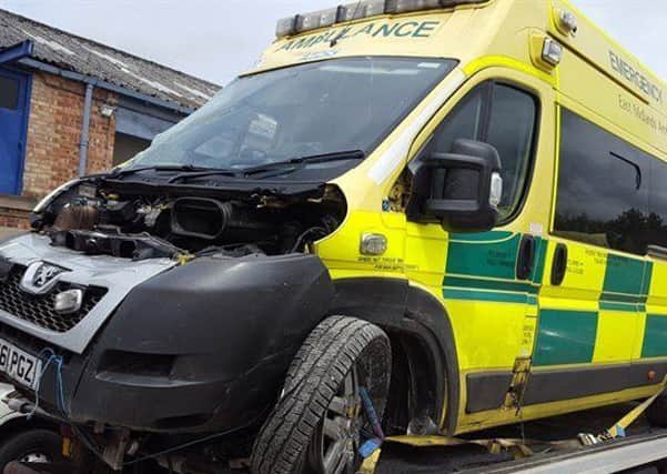 An ambulance damaged in a collision.