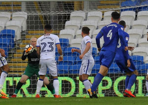 Picture by Gareth Williams/AHPIX.com; Football; The Emirates FA Cup; Cardiff City v Mansfield Town; 6/1/18  KO 15.00; Cardif City Stadium; copyright picture; Howard Roe/AHPIX.com; Mansfield keeper Conrad Logan saves comfortably from Cardiff's Sean Morrison