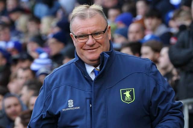 Picture by Gareth Williams/AHPIX.com; Football; The Emirates FA Cup; Cardiff City v Mansfield Town; 6/1/18 KO 15.00; Cardif City Stadium; copyright picture; Howard Roe/AHPIX.com; Stags boss Steve Evans in jovial mood ahead of kick-off at Cardiff