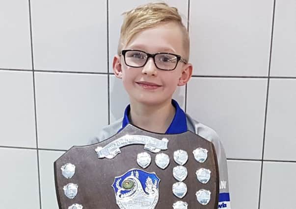 Stanley Milasinovich with the relay gala shield won by Sutton Swimming Club.
