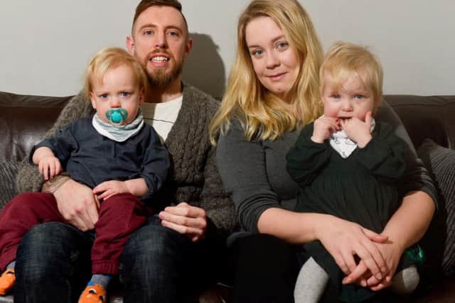 Daniel Bradbury with his partner Jordan Evans and their twins Lola and Jasper. Photo - SWNS