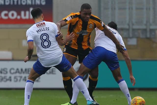 Picture by Gareth Williams/AHPIX.com; Football; Sky Bet League Two; Cambridge United v Mansfield Town; 13/1/18  KO 15.00; Cambs Glass Stadium; copyright picture; Howard Roe/AHPIX.com; Mansfield's Jacob Mellis and Malvind Benning wrestles with Cambridge's Uche Ikpeazu