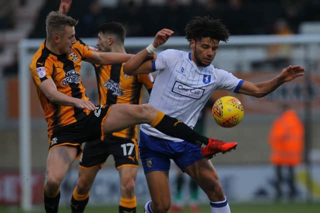 Picture by Gareth Williams/AHPIX.com; Football; Sky Bet League Two; Cambridge United v Mansfield Town; 13/1/18  KO 15.00; Cambs Glass Stadium; copyright picture; Howard Roe/AHPIX.com; Stags' Lee Angol tries to force his way past Cambridge's Harry Darling