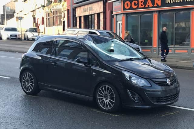 A pedestrian has serious injuries after a car crashed on Sutton Road