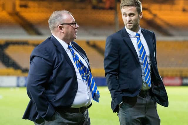 Steve Evans with Joel Byrom before the game