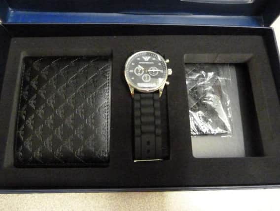 A fake Armani watch was among the items seized.