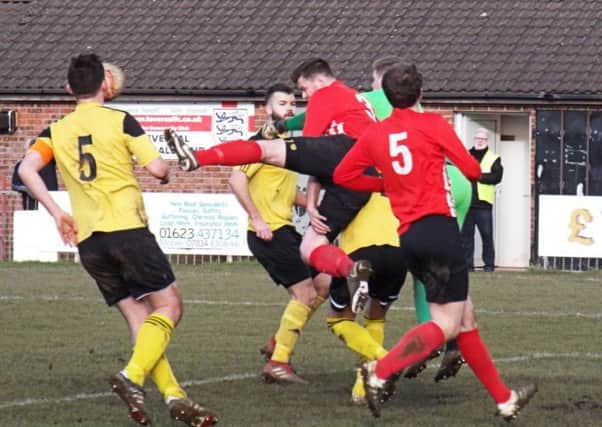 High-kicking action from Teversals win over Stapenhill. (PHOTO BY: Keith Parnill)