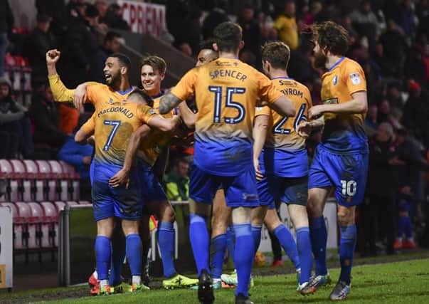 Mansfield Town players celebrate their late winner: Picture by Steve Flynn/AHPIX.com, Football: Skybet League Two match Morecambe -V- Mansfield Town at Globe Arena, Morecambe, Lancashire, England on copyright picture Howard Roe 07973 739229