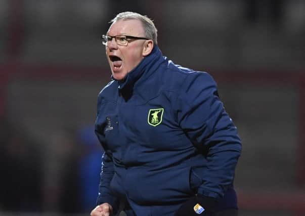Mansfield Town manager Steve Evans celebrates victory: Picture by Steve Flynn/AHPIX.com, Football: Skybet League Two match Morecambe -V- Mansfield Town at Globe Arena, Morecambe, Lancashire, England on copyright picture Howard Roe 07973 739229
