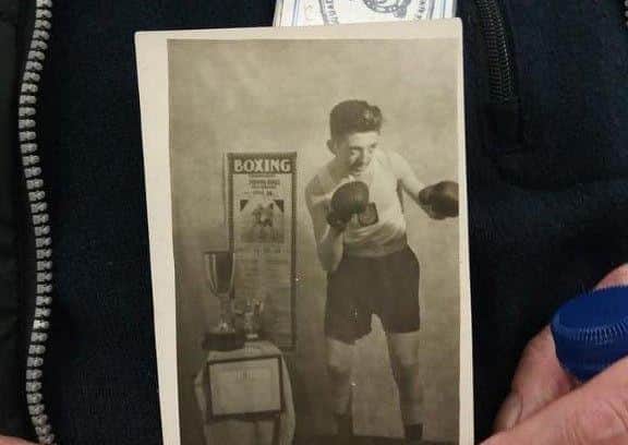 Sutton grandad Derek Young 82 visited the Air Training Corps 1300 Squdron 68 years after he joined himself asa 14 yar old in 1950. Here is him competing as  ayoung boxer for the ATC.