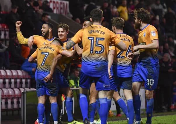 Mansfield Town players celebrate their late winner: Picture by Steve Flynn/AHPIX.com, Football: Skybet League Two match Morecambe -V- Mansfield Town at Globe Arena, Morecambe, Lancashire, England on copyright picture Howard Roe 07973 739229