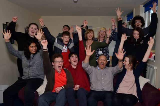 Dawn House School celebrating its 'Outstanding' Ofsted report, Principal Jenny McConnell is pictured with staff and pupils (PHOTO BY: Rachel Atkins)