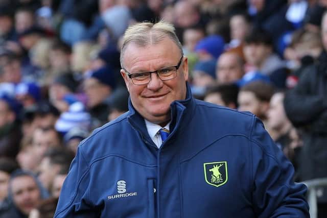 Picture by Gareth Williams/AHPIX.com; Football; The Emirates FA Cup; Cardiff City v Mansfield Town; 6/1/18  KO 15.00; Cardif City Stadium; copyright picture; Howard Roe/AHPIX.com; Stags boss Steve Evans in jovial mood ahead of kick-off at Cardiff