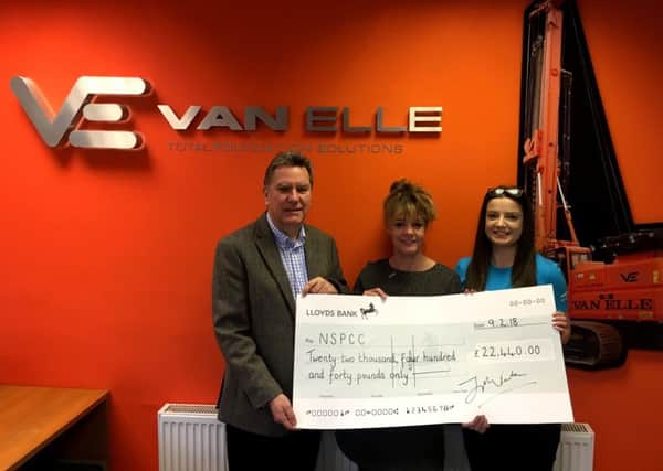 Van Elle boss Jon Fenton hands over a cheque to the NSPCCs community fundraising manager Claire Campbell and Childline volunteer Kate Frisby.