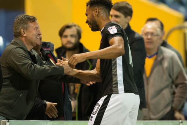 Mansfield vs Lincoln - Matt Green of Lincoln City with Mansfield town fans at full time - Pic By James Williamson