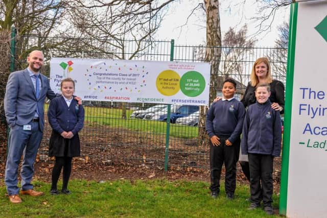 Head teacher Tony Warsop with head of school Caroline Armstrong and three Flying High pupils, from left, Phoebe Wright, Jamaine Foster and Max Marriott.