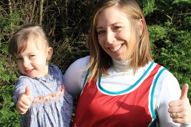 Mum Becky Rawson, who is to run the London Marathon in support of the heart charity that helped her daughter, Fleur.