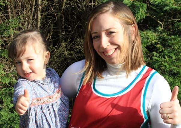 Mum Becky Rawson, who is to run the London Marathon in support of the heart charity that helped her daughter, Fleur.