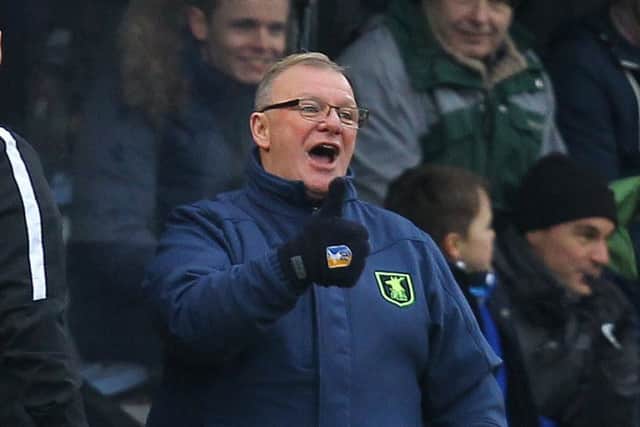 Picture by Gareth Williams/AHPIX.com; Football; Sky Bet League Two; Cambridge United v Mansfield Town; 13/1/18  KO 15.00; Cambs Glass Stadium; copyright picture; Howard Roe/AHPIX.com; Steve Evans sees the funny side