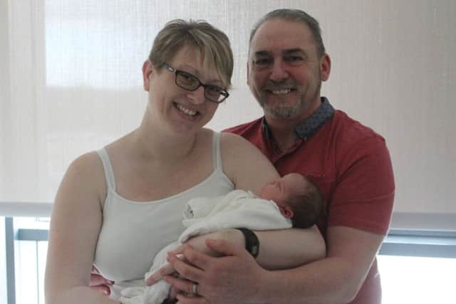 Proud mum and dad, Sam and Paul Williamson, with their new daughter, Kitty-Mae.