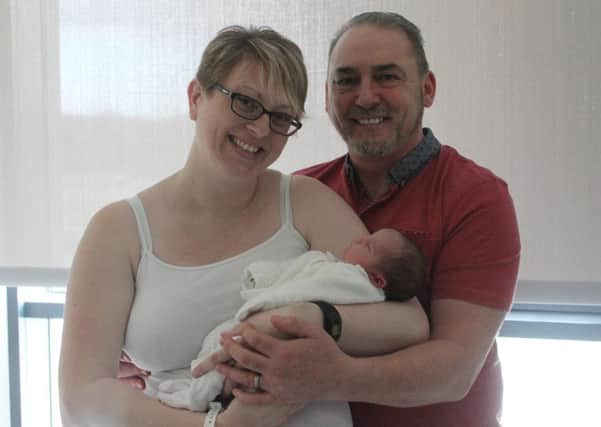 Proud mum and dad, Sam and Paul Williamson, with their new daughter, Kitty-Mae.