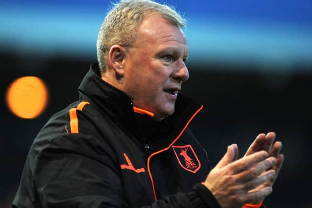 Manager Steve Evans.