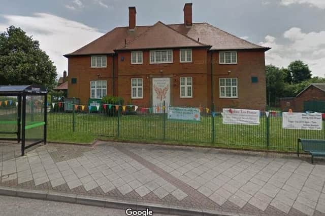 The village hall where the library will be moved.