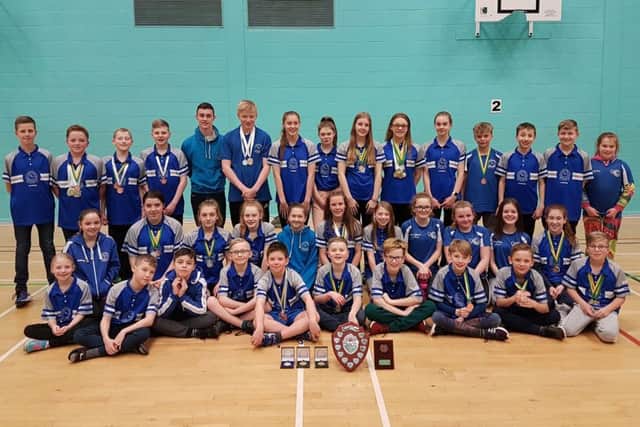 The triumphant Sutton Swimming Club team that competed at the county championships.