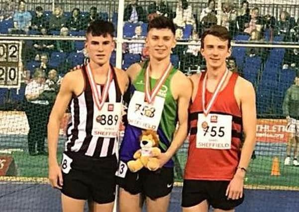 On the podium for Mansfield Harriers is Luke Duffy (centre).