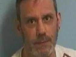Mark Christopher Woolley.