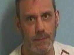 Mark Christopher Woolley.