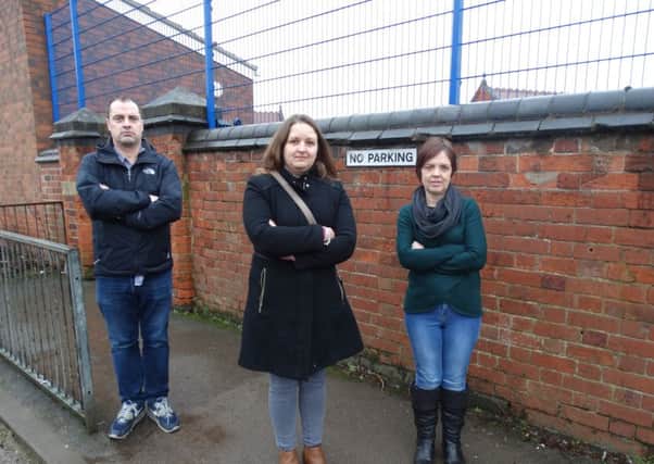 Left to right) David Hennigan, Councillor Samantha Deakin and Julie Maltby.on Clipstone Ave, Sutton.