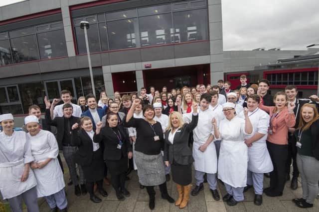 Students pictured outside West Notts Colleges Derby Road campus as they prepare to take over the hotel. (PHOTO BY: Tracey Whitefoot)