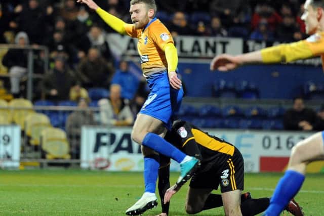 Alfie Potter slams home one of his goals.