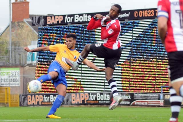 Mansfield Town v Exeter City.
Jacob Mellis has a crack at goal in the second half.