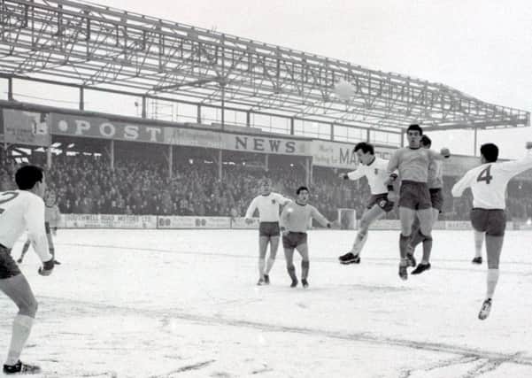 Stags in action against Walsall on a snowy day in January 1966.