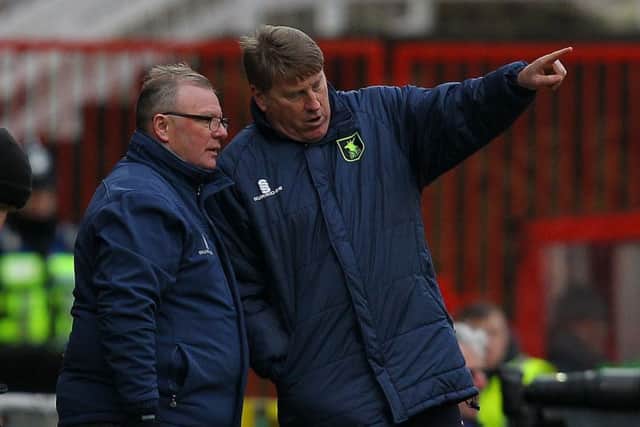 Picture by Gareth Williams/AHPIX.com; Football; Sky Bet League Two; Swindon Town v Mansfield Town; 10/2/18 KO 15.00; The Energy Check County Ground; copyright picture; Howard Roe/AHPIX.com; Steve Evans and Paul Raynor discuss making changes at Swindon