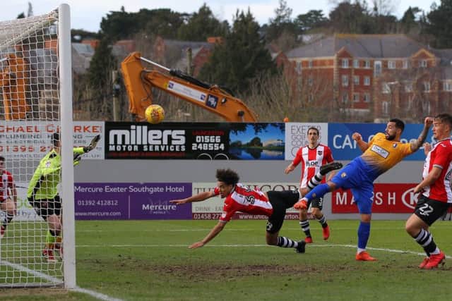 Picture by Gareth Williams/AHPIX.com; Football; Sky Bet League Two; Exeter City v Mansfield Town; 17/2/18 KO 15.00; St James Park; copyright picture; Howard Roe/AHPIX.com; Mansfield's Kane Hemmings sees his effort tipped onto the Exeter cross bar by keeper Christy Pym