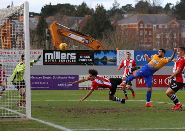 Picture by Gareth Williams/AHPIX.com; Football; Sky Bet League Two; Exeter City v Mansfield Town; 17/2/18  KO 15.00; St James Park; copyright picture; Howard Roe/AHPIX.com; Mansfield's Kane Hemmings sees his effort tipped onto the Exeter cross bar by keeper Christy Pym