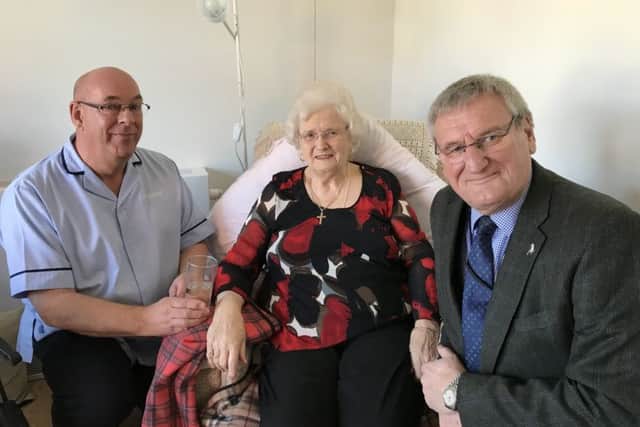 Jean Cox with Coun Stuart Wallace (right) and support worker Trevor Warren, of Nottinghamshire County Council.