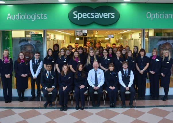 The proud Specsavers team at the Sutton branch.