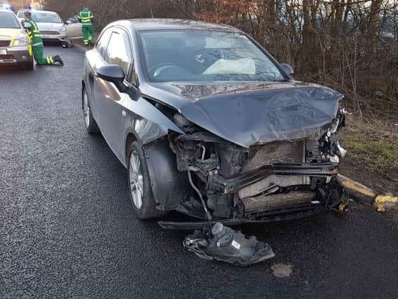 A car damaged in the collision.