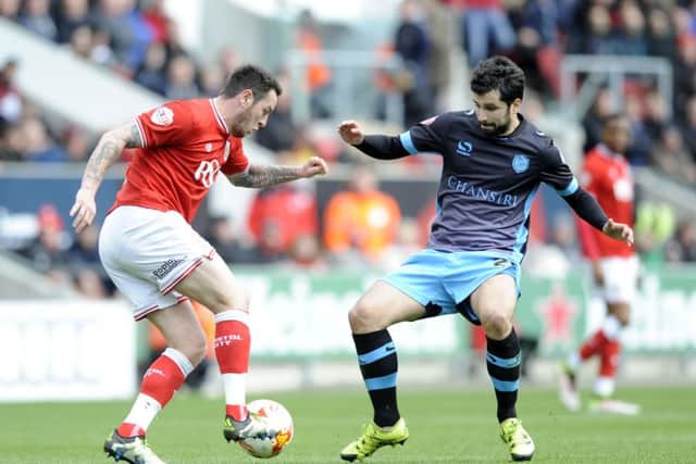 Lee Tomlin, pictured here in action for Bristol City, is proving to be a hit with Forest during his loan spell from Cardiff