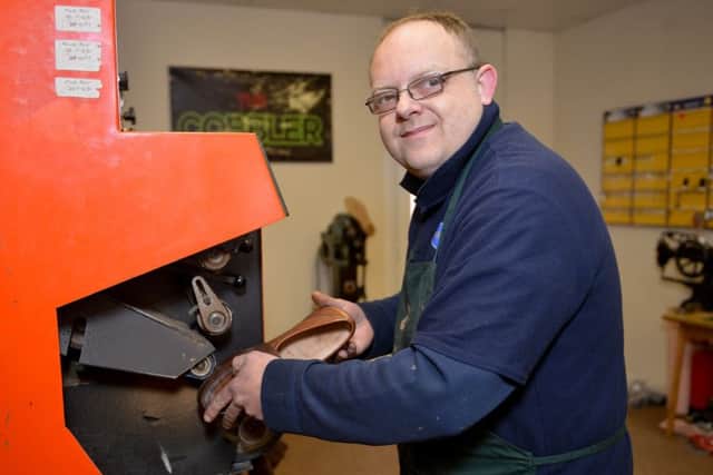 Shoe repairer David Lee at his new shop on Outram Street, Sutton-In-Ashfield
