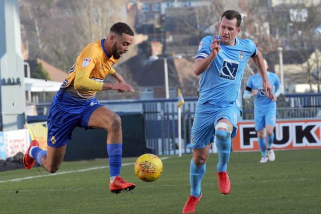 Mansfield Town v Coventry
CJ Hamilton collects the ball on a run down the right wing.