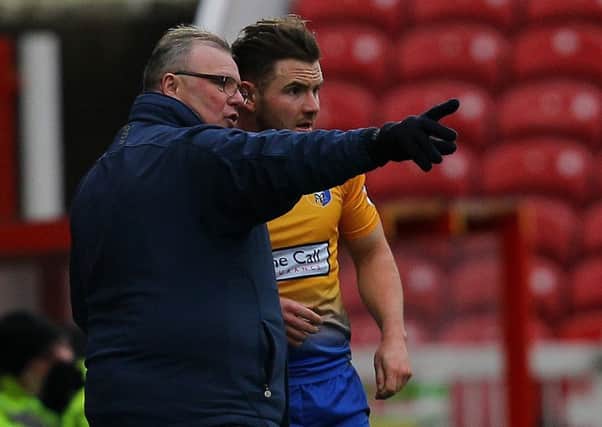 Picture by Gareth Williams/AHPIX.com; Mansfield boss Steve Evans gives instructions to Alex MacDonald