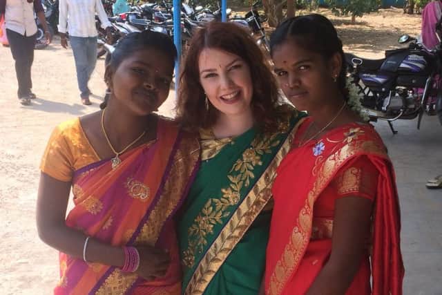 Eleanor Frost (centre) with two of the women she helped while in India.