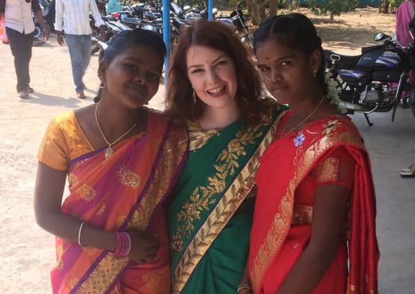 Eleanor Frost (centre) with two of the women she helped while in India.